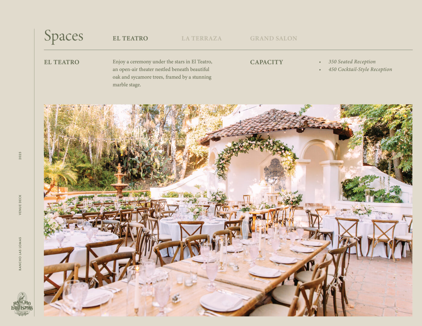 Outdoor wedding ceremony space with wooden chairs and tables, elegant decor, string lights, and lush greenery surrounding a white stucco stage with a tiled roof and floral arrangements, creating a warm and inviting atmosphere.